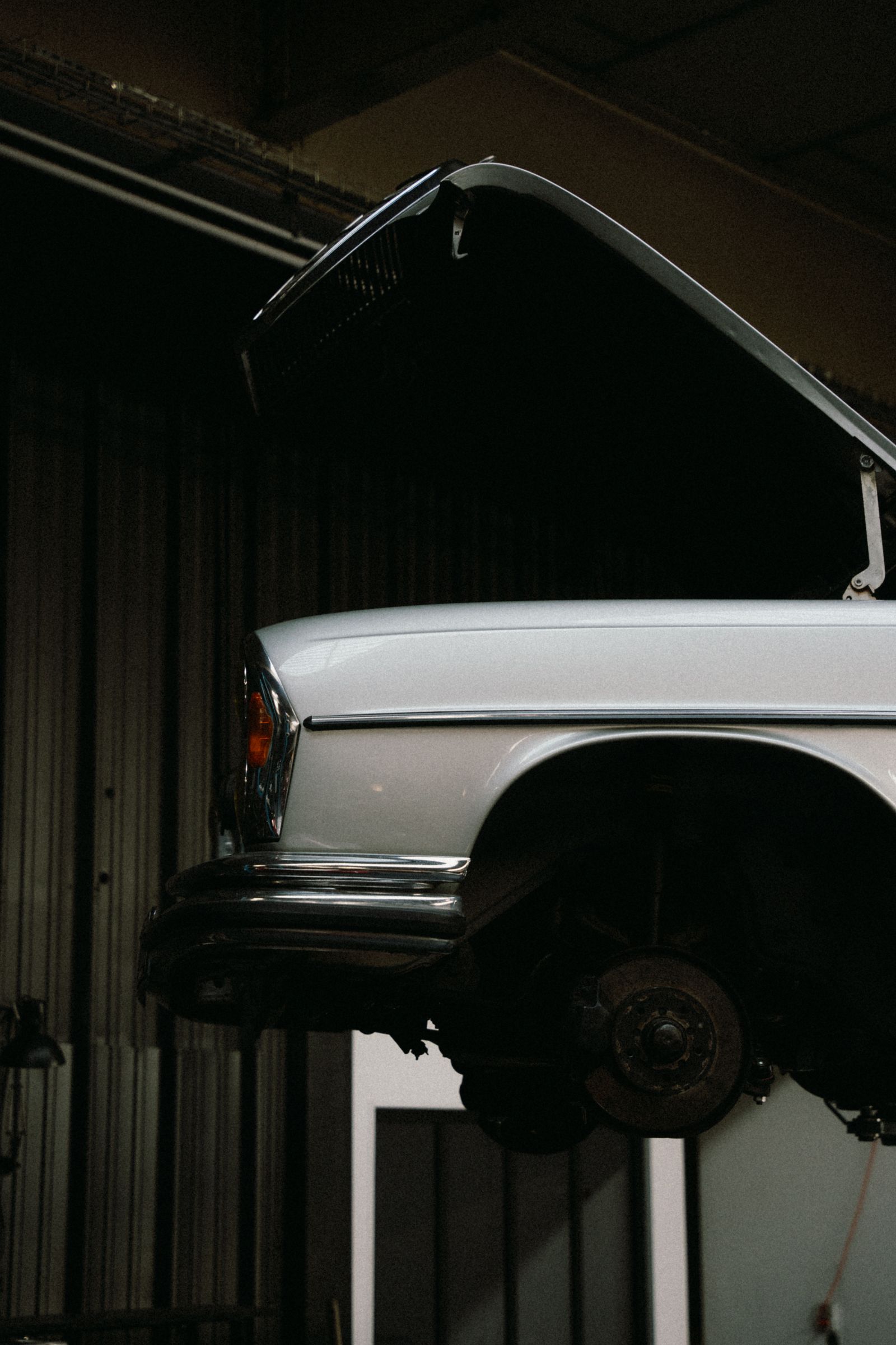 Car up in a garage workshop